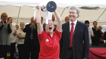 Jo holds the trophy aloft