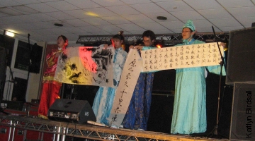 China not only read a poem, but display it written in intricate Calligraphy too, accompanied by a beautiful Chinese song.