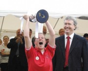 Jo holds the trophy aloft