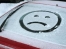 Sad face snow