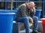 Man asleep on bench